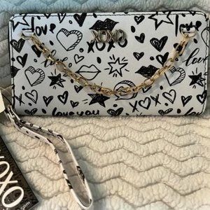 Full size XOXO wristlet wallet trimmed in gold